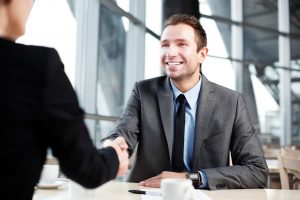 Handshake after a successful interview.